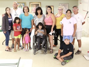 Members of Flagstaff Nuestras Raíces take time out of their all-day renovation project on July 13, to take a group photo. Photo by Frank X. Moraga / AmigosNAZ