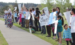 Supporters of reduced tuition for DACA students rallied in front of the Flagstaff City Hall on April 29. Photo by Eduardo Tapia ©2015