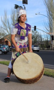 A student from a local cultural education program shows her support for reduced tuition rates for DACA students. Photo by Eduardo Tapia ©2015